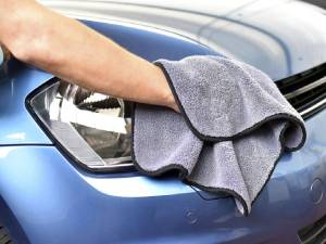 man-polishing-car-royalty-free-image-1623497498 (1)